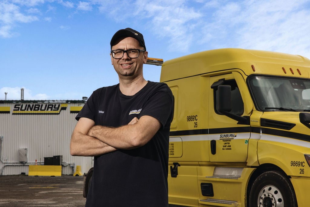 Sunbury Driver Employee Standing in Front of his Truck
